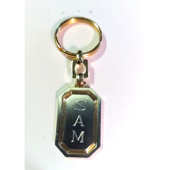 Monogram Sam Keychain Gold Tone. - Picture 1 of 5
